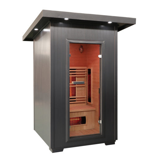 Infrared sauna with wooden interior and metallic exterior on a white background
