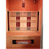 Infrared sauna with wooden interior and heating elements.