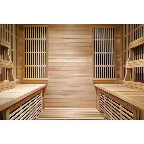 Wooden sauna interior with benches and lattice design