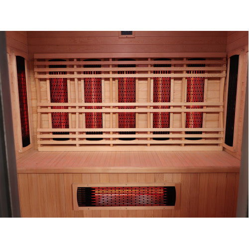 Infrared sauna with wooden interior and heating elements.