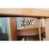 Wooden chair with 'Harvia' logo on a blurred background