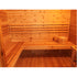 Wooden sauna with a bench and wooden bucket