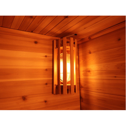 Wooden interior of a sauna with warm lighting